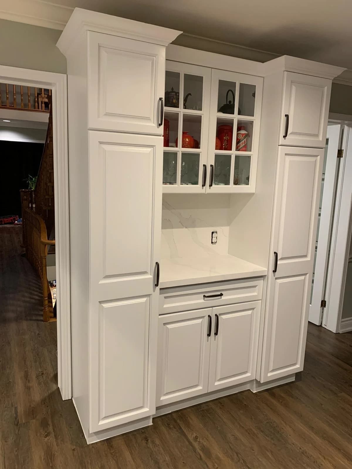 After: dark kitchen white cabinetry