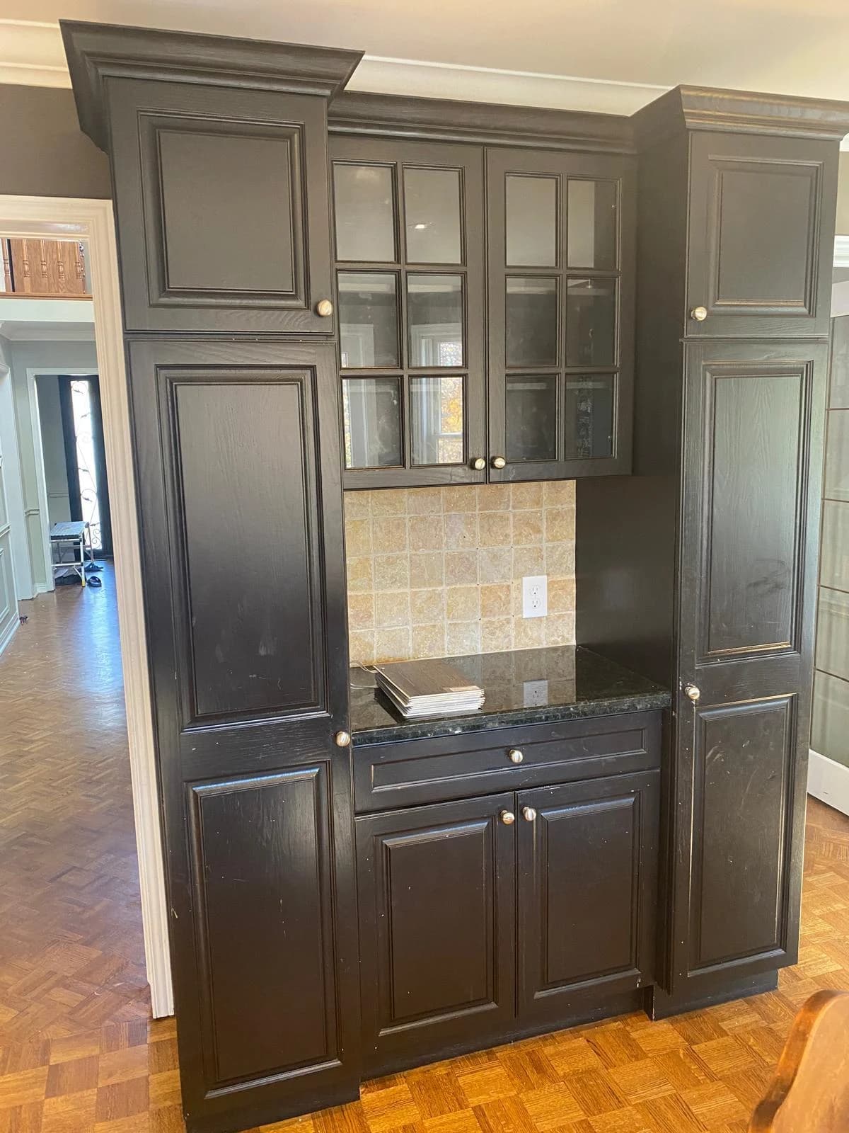 Before: dark kitchen white cabinetry