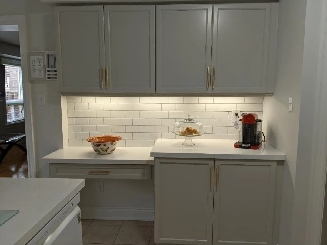 After: grey kitchen cabinetry