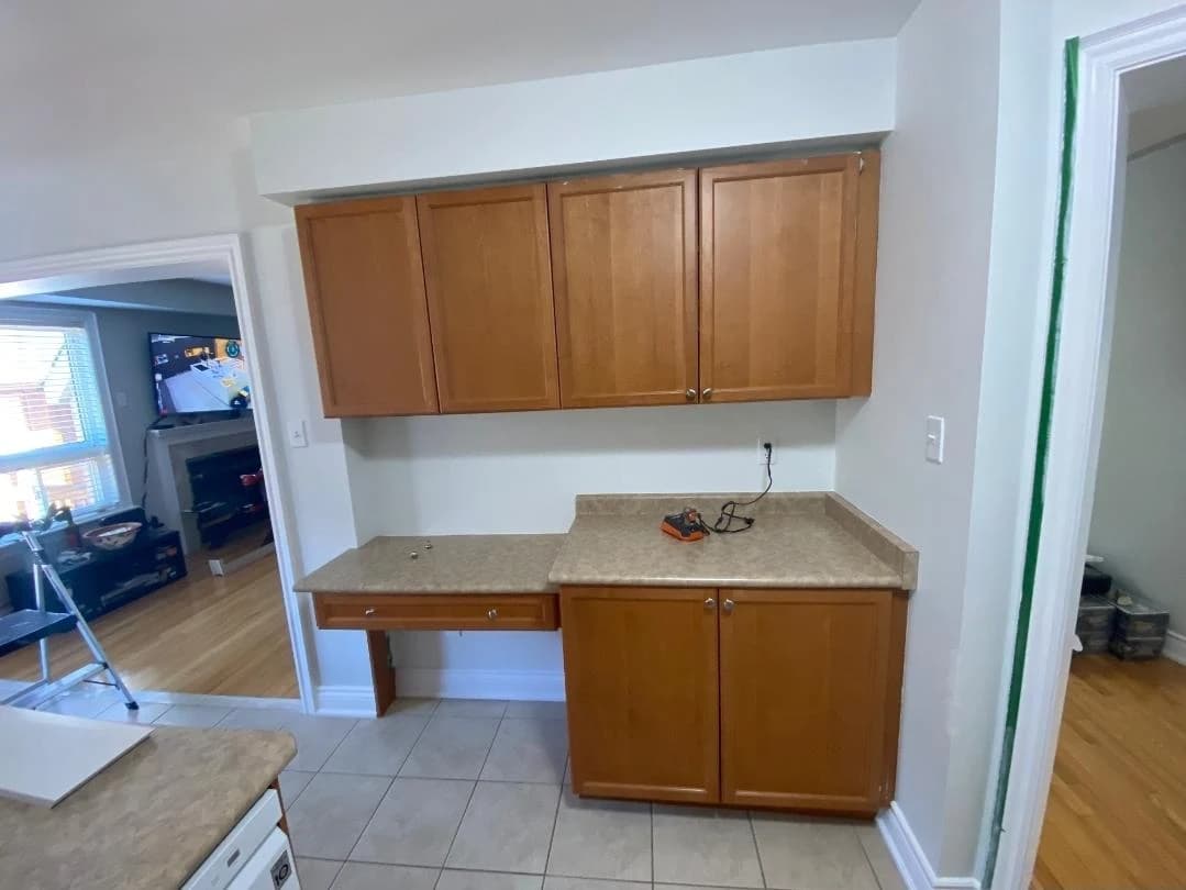 Before: grey kitchen cabinetry