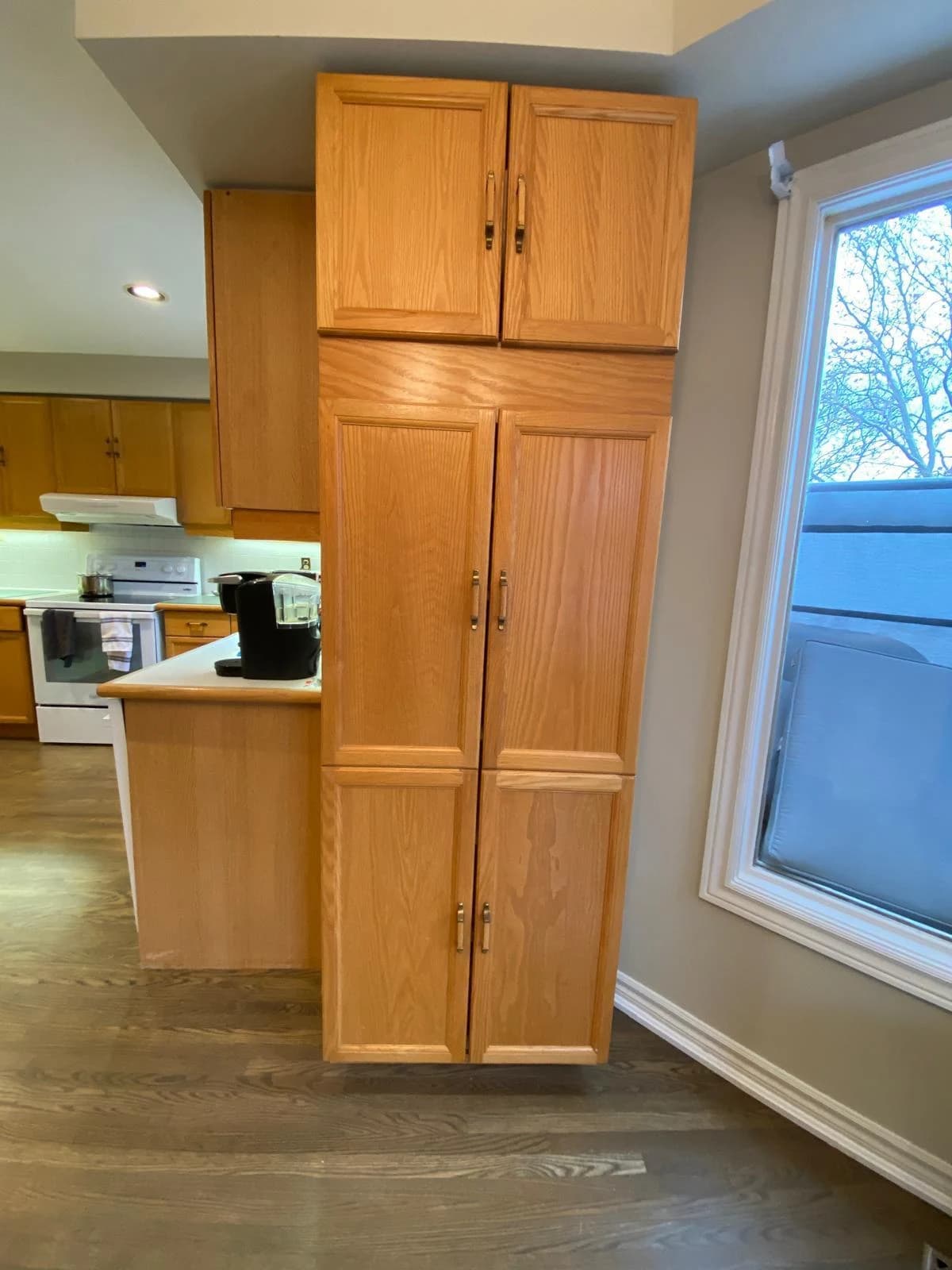 Before: island neutral cabinetry