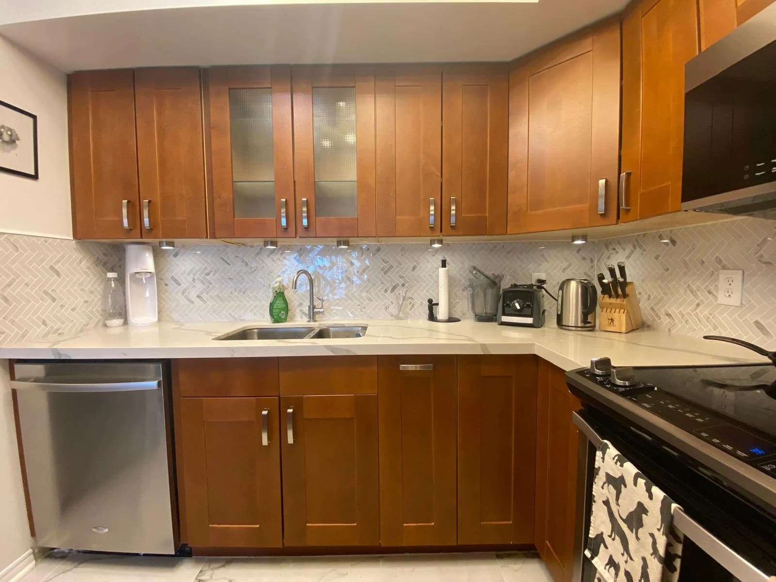 Before: marble peninsula cabinetry