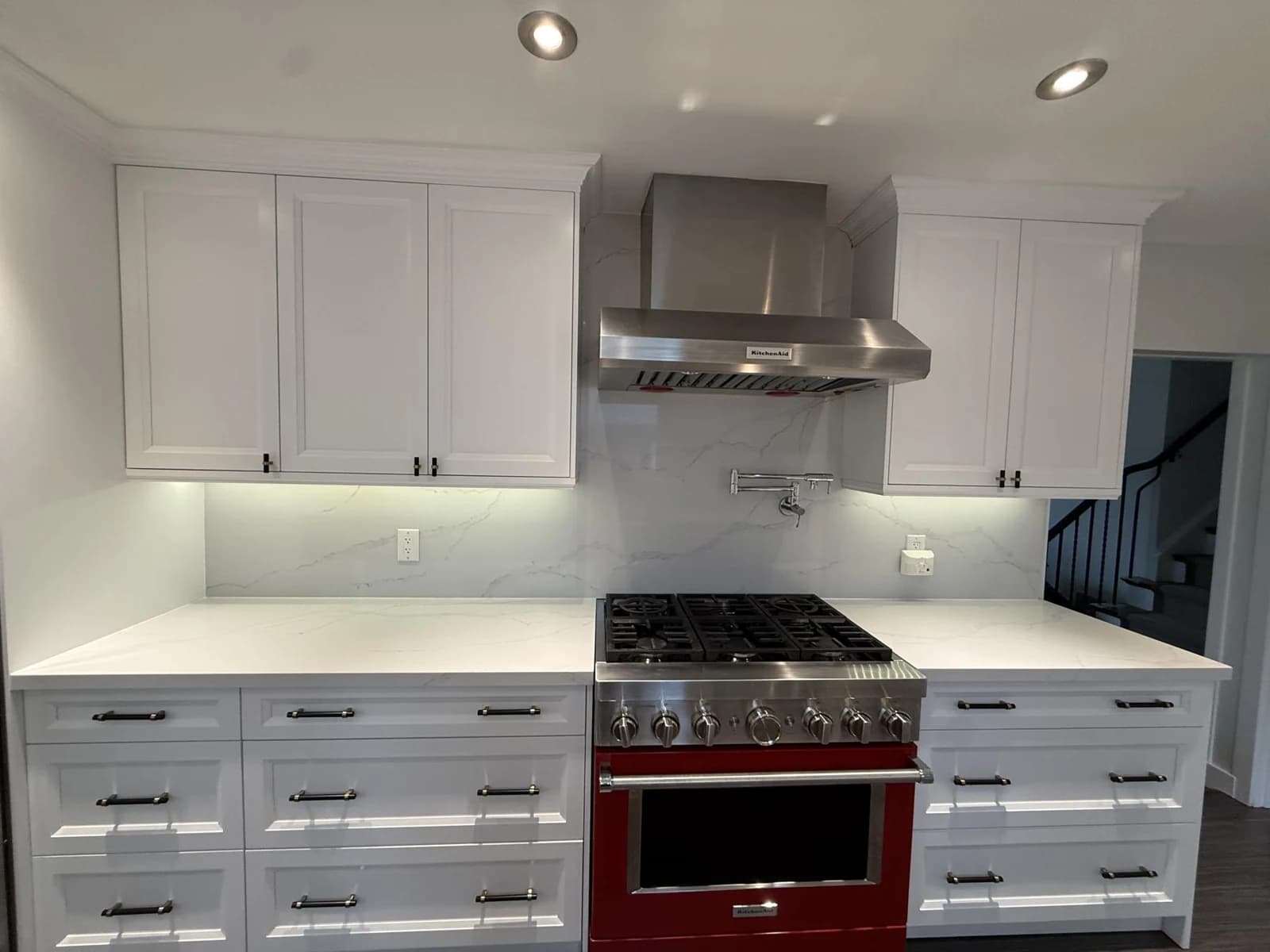 After: red range kitchen cabinetry