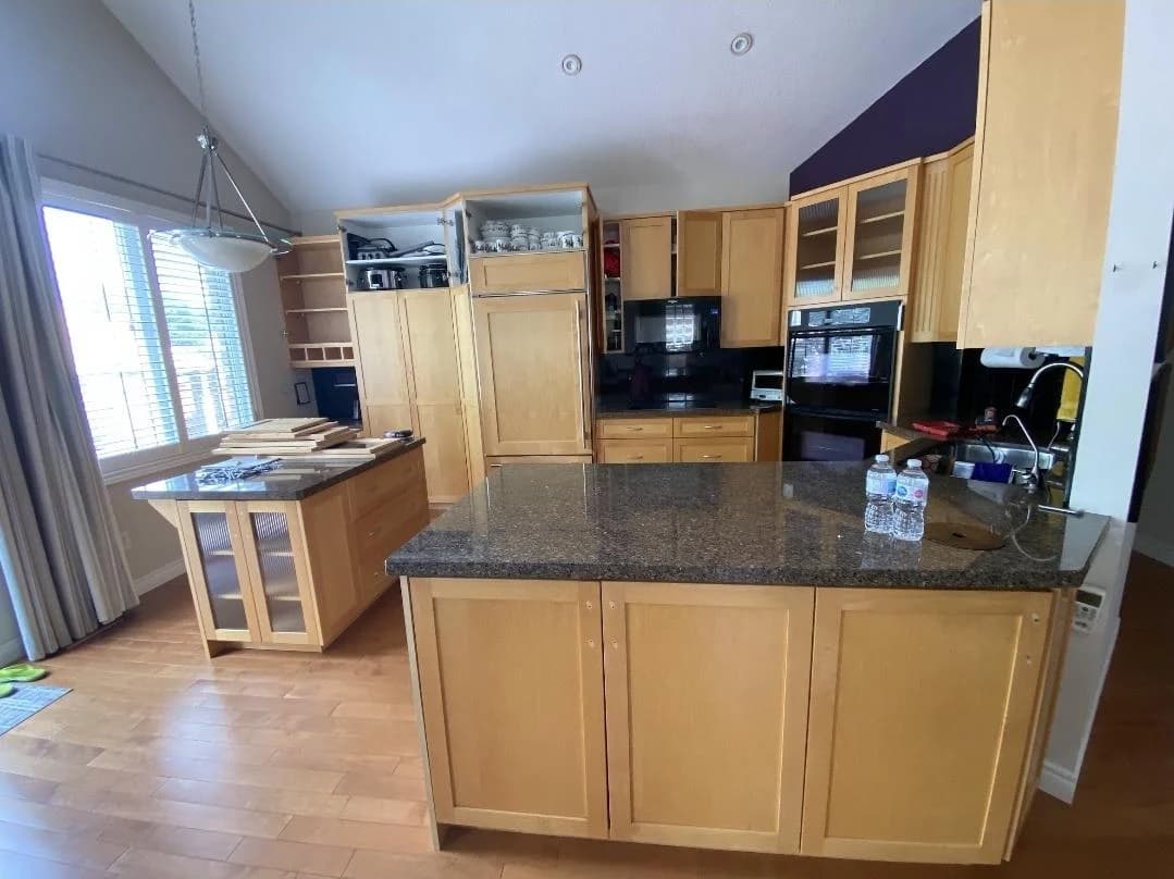Before: vaulted kitchen cabinetry