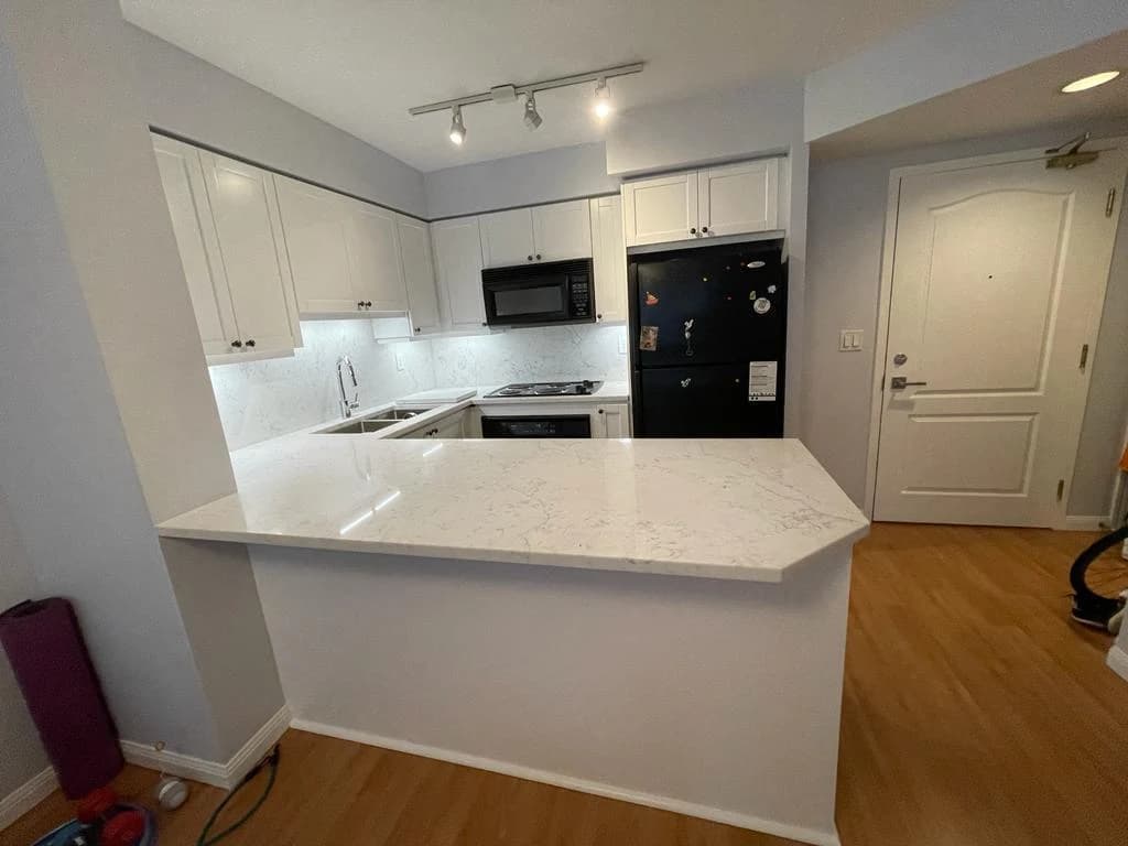 After: wood peninsula cabinetry