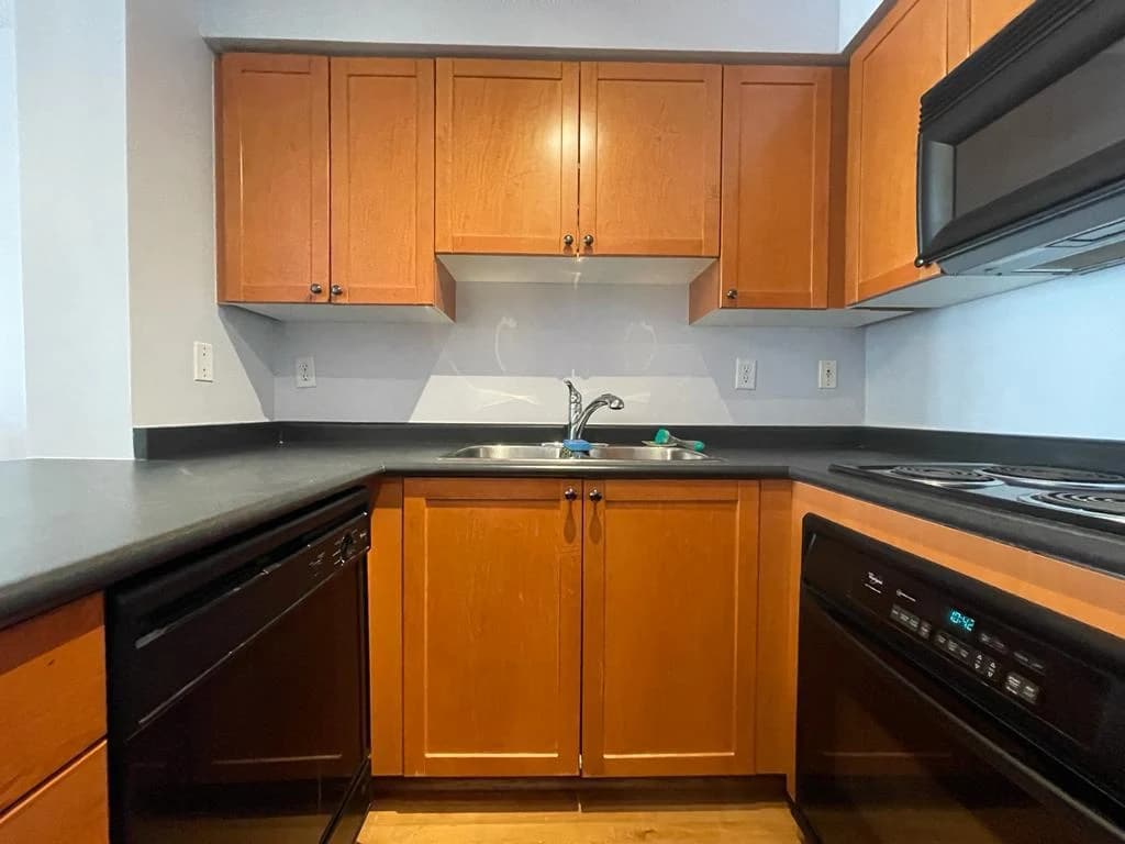 Before: wood peninsula cabinetry
