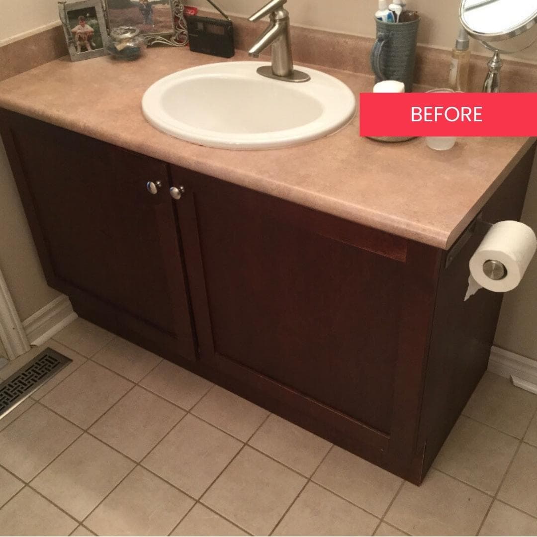 Dark bathroom vanity before refinishing